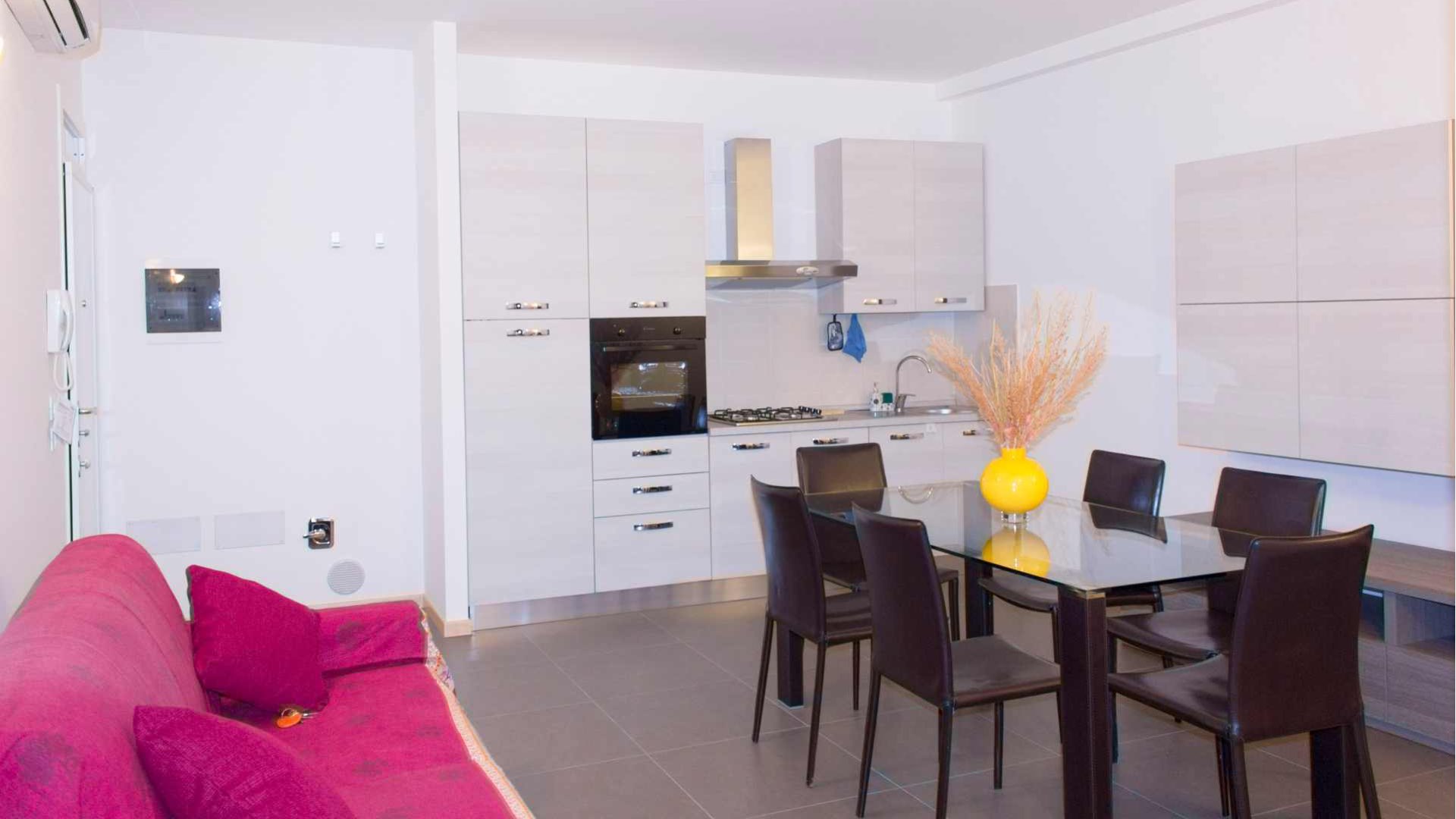 Zona Cucina - living con divano letto